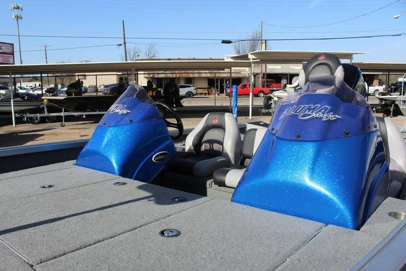 Slide: The Image of 2019 Alumacraft XB 200 boat with blue consoles and gray seating. - 12
