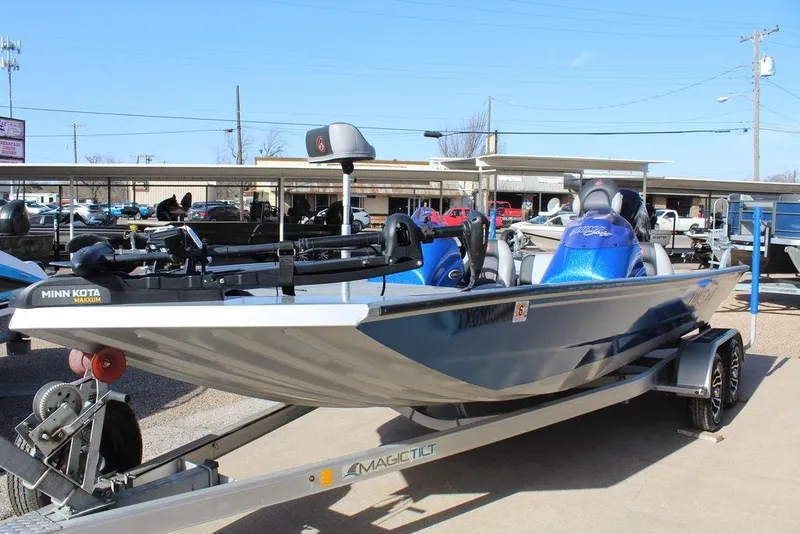Slide: The Image of 2019 Alumacraft XB 200 boat on trailer, featuring Minn Kota Maxxum trolling motor. - 7