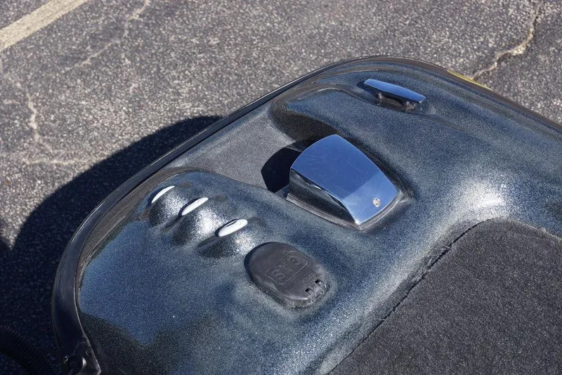 Slide: The Image of 2010 Bass Cat Cougar boat detail with metallic finish and chrome accents. - 20