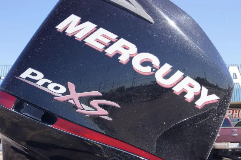 Slide: The Image of Mercury Pro XS engine on a 2010 Bass Cat Cougar boat, close-up view. - 5