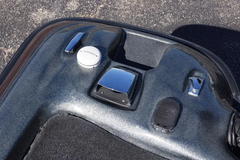 Slide: The Image of 2010 Bass Cat Cougar boat dashboard with controls and switches. - 7