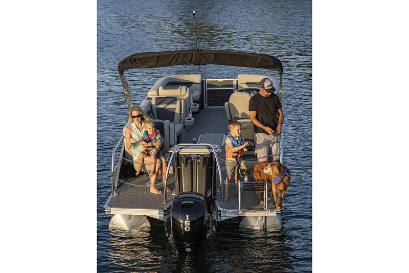Slide: The Image of Manufacturer Provided Image: 2022 Barletta Cabrio 22CC pontoon boat with family and dog on water. - 15