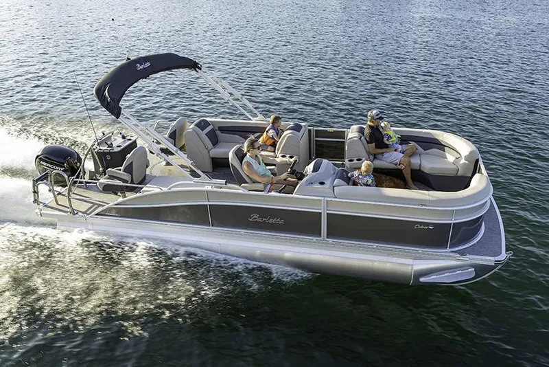 Slide: The Image of Manufacturer Provided Image: 2022 Barletta Cabrio 22CC pontoon boat cruising on water with passengers. - 3
