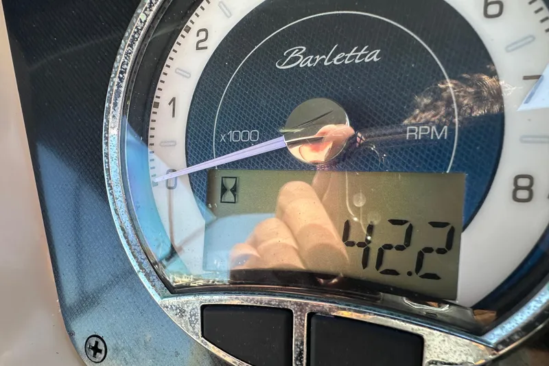 Slide: The Image of Close-up of Barletta Cabrio 22CC 2022 RPM gauge displaying 422. - 9
