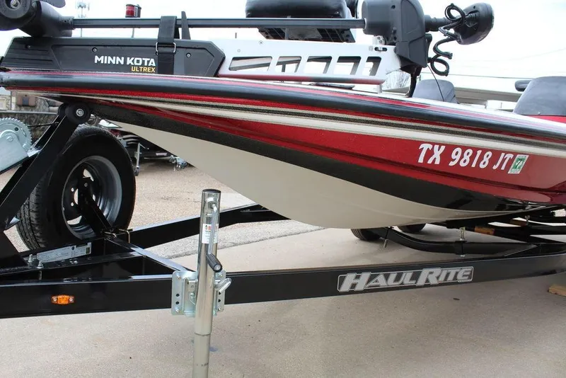 Slide: The Image of 2002 Skeeter ZX225 boat on HaulRite trailer with Minn Kota Ultrex motor. - 9