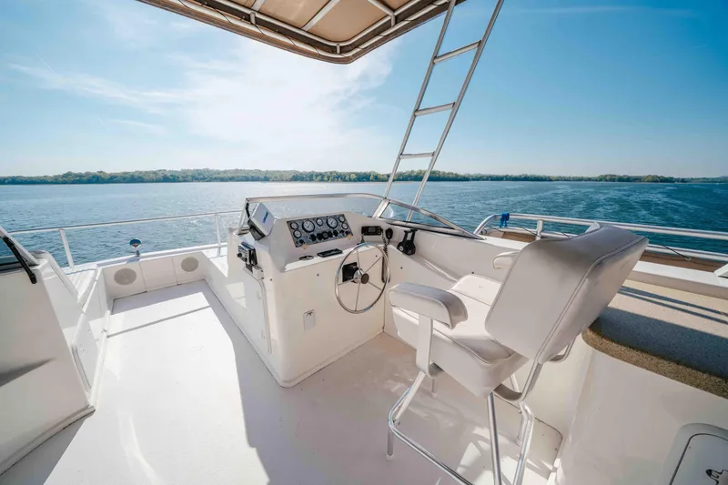 Slide: The Image of Helm of 2009 Horizon 18x85 yacht with scenic water view. - 25