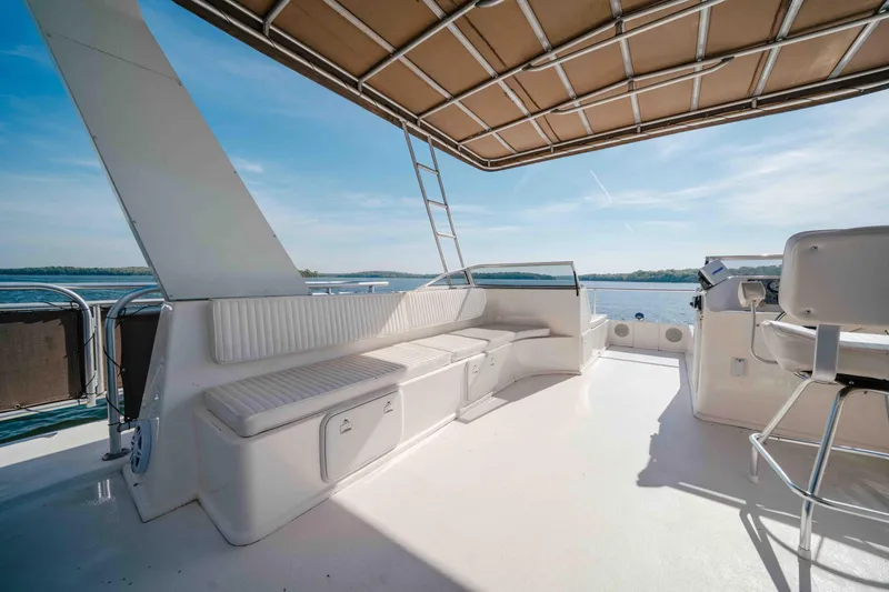 Slide: The Image of Spacious deck of 2009 Horizon 18x85 yacht with seating and water view. - 30