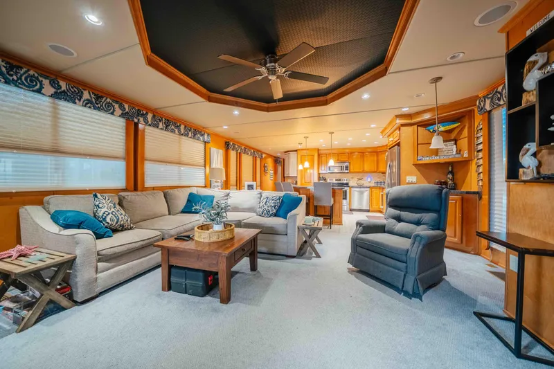 Slide: The Image of Luxurious 2009 Horizon 18x85 houseboat interior with cozy living area and modern kitchen. - 38