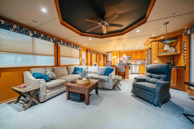 Slide: The Image of Luxurious 2009 Horizon 18x85 houseboat interior with modern kitchen and cozy living area. - 39