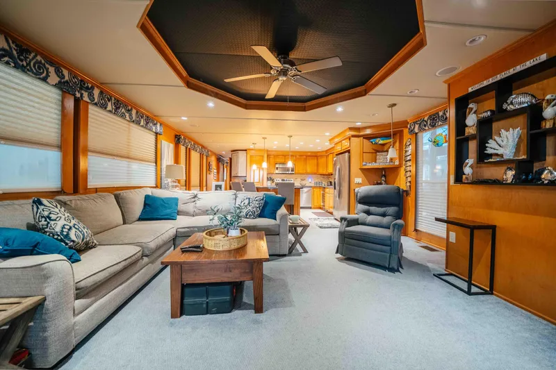 Slide: The Image of Luxurious 2009 Horizon 18x85 houseboat interior with cozy living area and modern kitchen. - 40