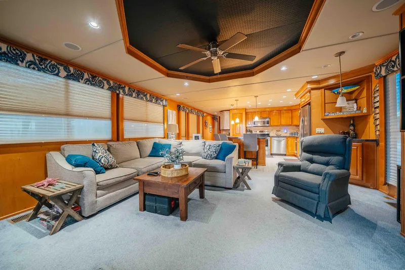 Slide: The Image of Luxurious 2009 Horizon 18x85 houseboat interior with cozy living area and modern kitchen. - 41