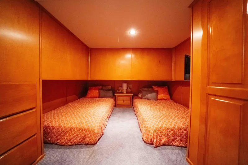 Slide: The Image of Cozy twin bedroom with orange bedding in 2009 Horizon 18x85 model. - 45