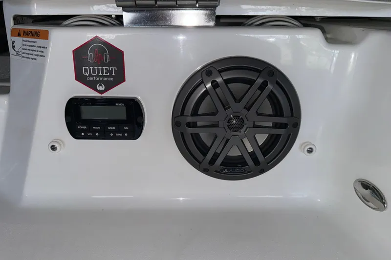 Slide: The Image of 2023 Scarab 255 ID audio system with JL Audio speaker and control panel. - 17