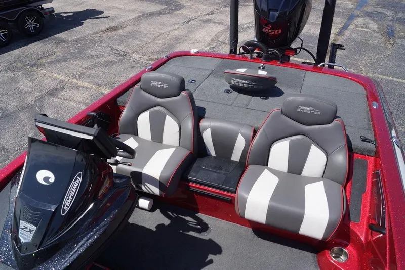 Slide: The Image of 2019 Skeeter ZX250 boat interior with dual seats and control panel. - 12