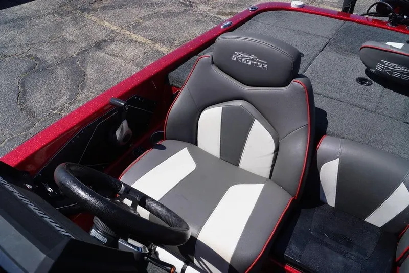 Slide: The Image of 2019 Skeeter ZX250 boat interior with gray and white seating. - 16