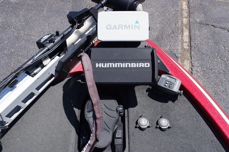 Slide: The Image of 2019 Skeeter ZX250 boat dashboard with Garmin and Humminbird electronics. - 26