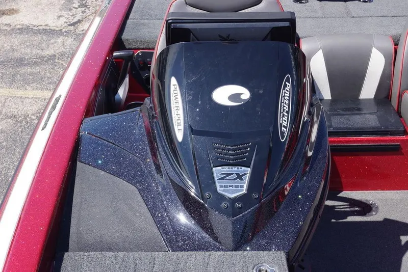 Slide: The Image of 2019 Skeeter ZX250 boat interior with Power-Pole branding and sleek design. - 27
