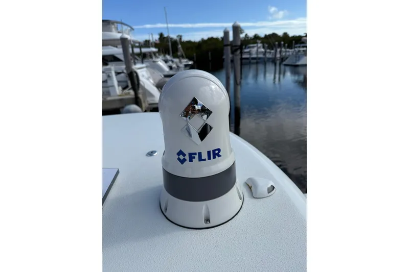 Slide: The Image of FLIR camera on 2024 Contender 39 ST boat, docked at marina. - 28