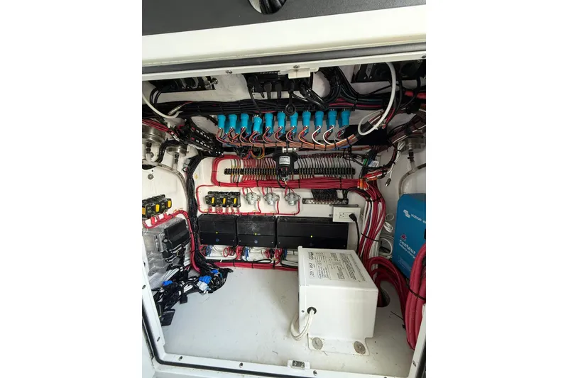 Slide: The Image of Electrical system of a 2024 Contender 39 ST boat, showcasing wiring and components. - 38