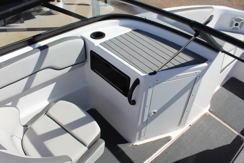 Slide: The Image of Interior view of a 2019 Skeeter SX190 boat, featuring seating and storage compartments. - 10