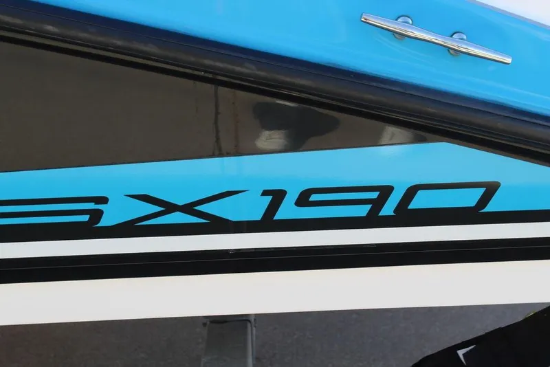 Slide: The Image of 2019 Skeeter SX190 boat with blue and black detailing. - 6