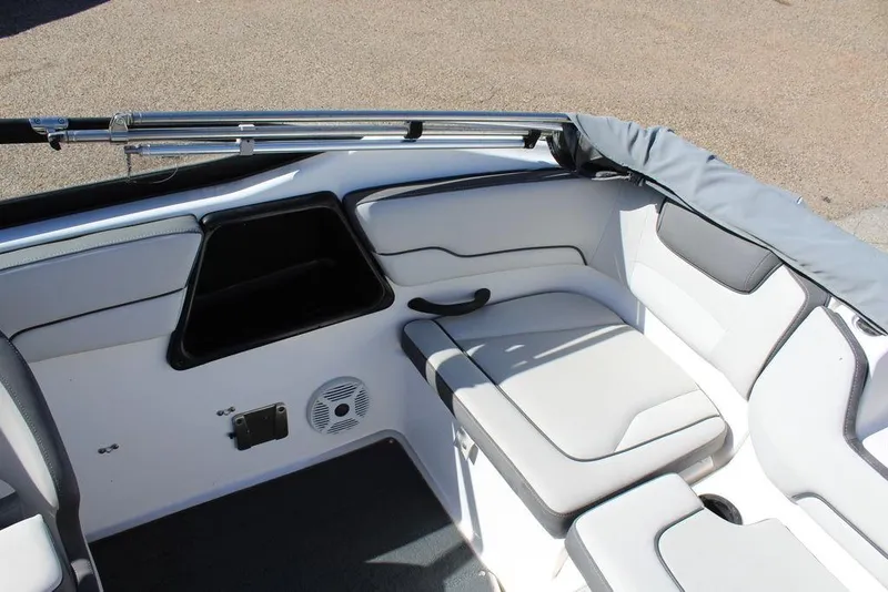 Slide: The Image of 2019 Skeeter SX190 boat interior with cushioned seating and storage compartments. - 8