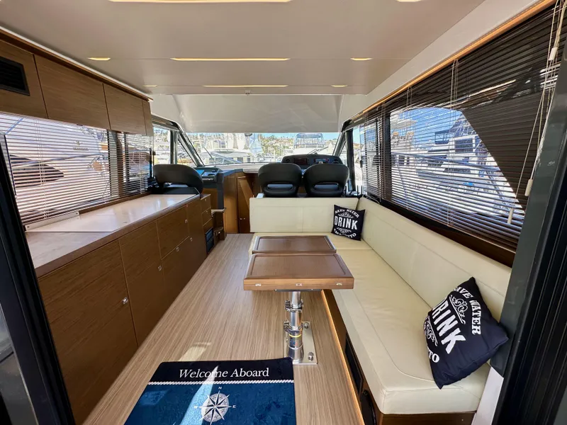 Slide: The Image of Luxurious interior of 2024 Bavaria R40 yacht with modern seating and elegant wood finishes. - 45