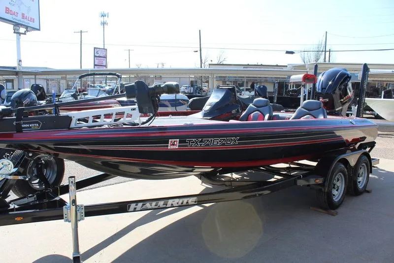 Slide: The Image of 2018 Skeeter ZX225 bass boat on trailer at dealership. - 4
