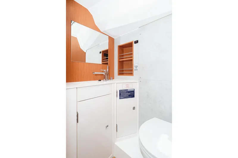 Slide: The Image of Modern bathroom interior of 2023 Bavaria C42 yacht, featuring sleek cabinetry and fixtures. - 46