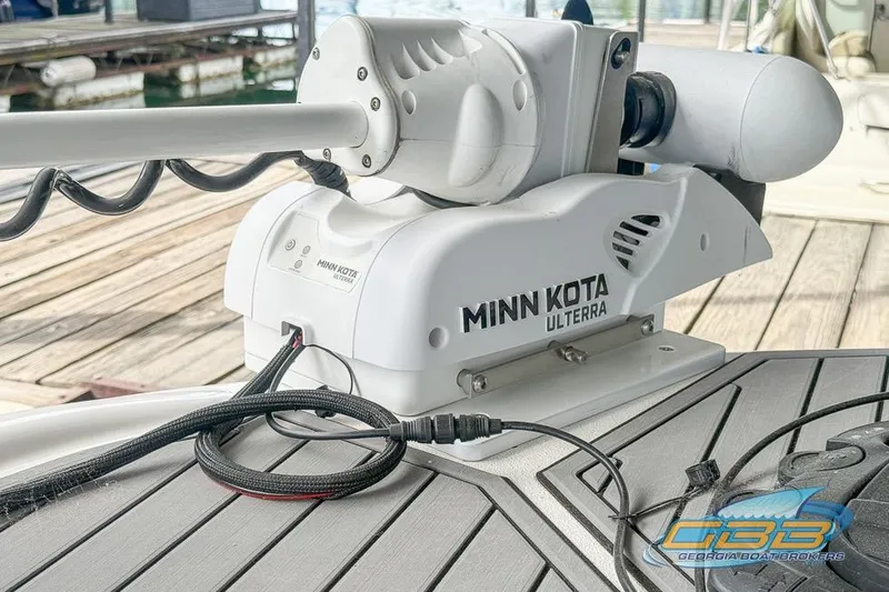 Slide: The Image of Minn Kota Ulterra trolling motor on 2022 NauticStar 251 Hybrid boat deck. - 10
