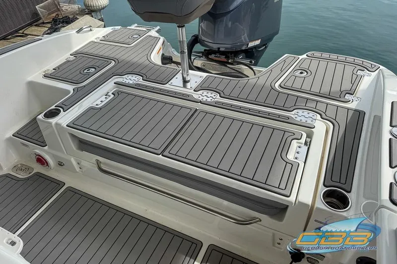Slide: The Image of 2022 NauticStar 251 Hybrid boat deck with sleek, modern design and durable flooring. - 20