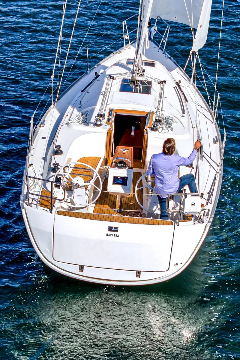 Slide: The Image of 2024 Bavaria Cruiser 34 sailing on open water. - 8