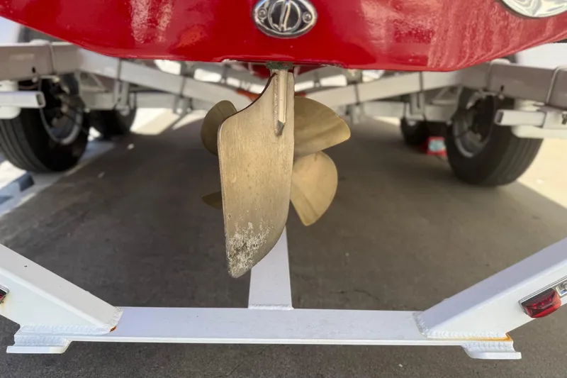 Slide: The Image of Propeller of a 1992 Elite Craft Riveria boat on a trailer. - 18