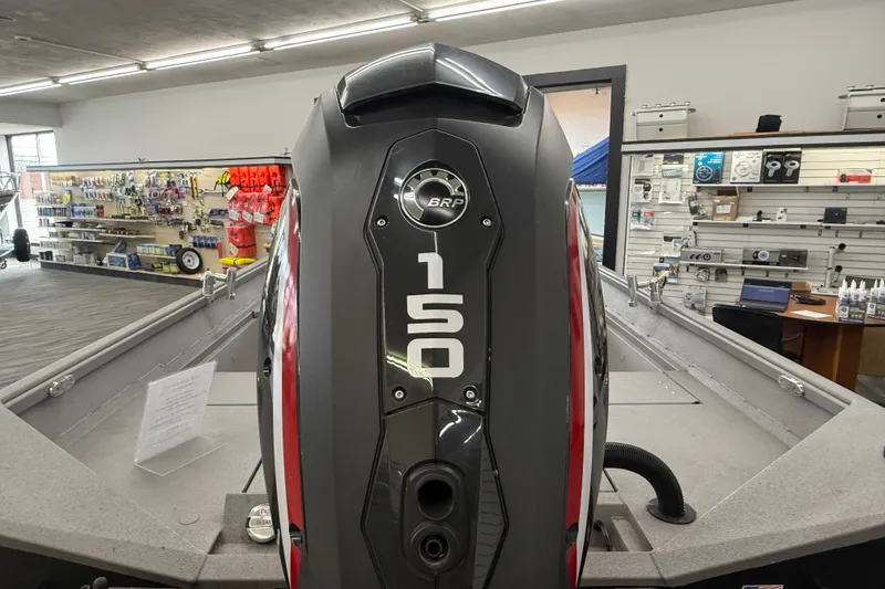 Slide: The Image of 2020 Alumacraft 20 Bay boat with BRP 150 engine in showroom. - 19