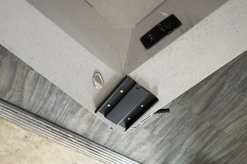 Slide: The Image of 2020 Alumacraft 20 Bay boat interior with control panel and seat mount. - 38