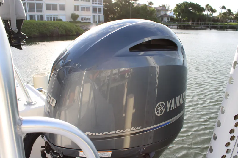 Slide: The Image of 2017 Robalo R200 Center Console with Yamaha outboard motor on calm water. - 14