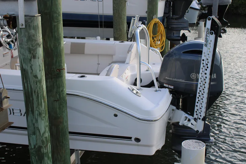 Slide: The Image of 2017 Robalo R200 Center Console boat docked with Yamaha outboard motor. - 18