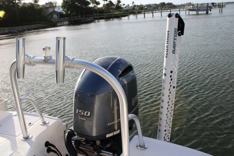 Slide: The Image of 2017 Robalo R200 Center Console boat with Yamaha 150 engine on calm water. - 19
