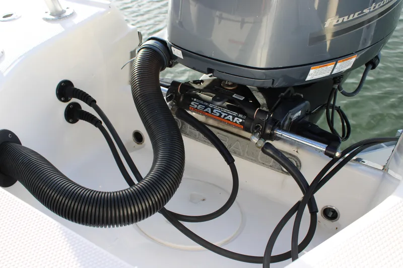 Slide: The Image of 2017 Robalo R200 Center Console boat engine with SeaStar hydraulic steering system. - 20