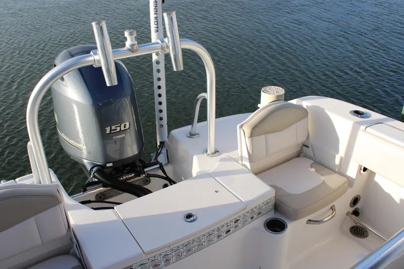 Slide: The Image of 2017 Robalo R200 Center Console boat with Yamaha 150 engine on calm water. - 4