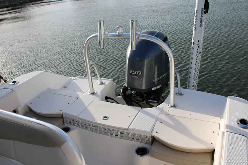 Slide: The Image of 2017 Robalo R200 Center Console boat with Yamaha 150 engine on calm water. - 7