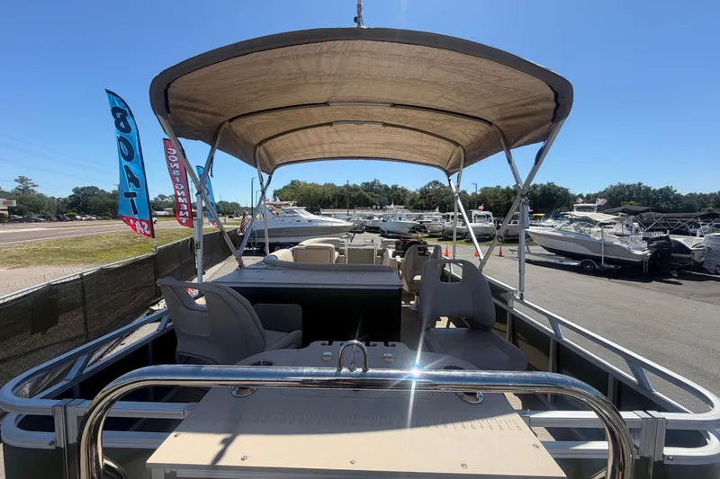 Slide: The Image of 2023 Tahoe Pontoon GT 2385 RF at a boat dealership. - 21