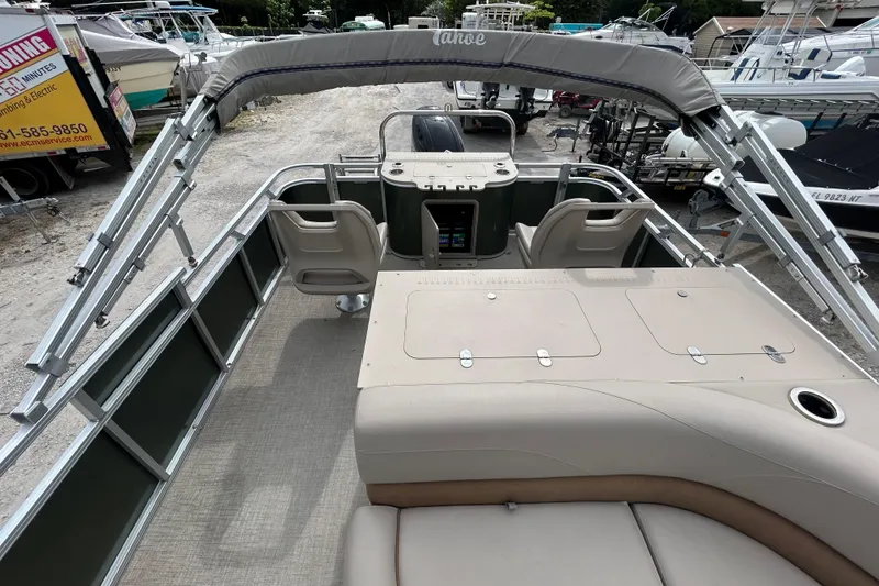 Slide: The Image of 2023 Tahoe Pontoon GT 2385 RF with Suzuki 200 engine in parking lot. - 3