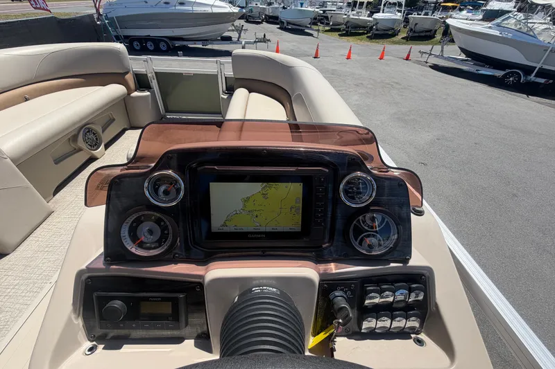 Slide: The Image of Dashboard of 2023 Tahoe Pontoon GT 2385 RF with navigation system. - 45