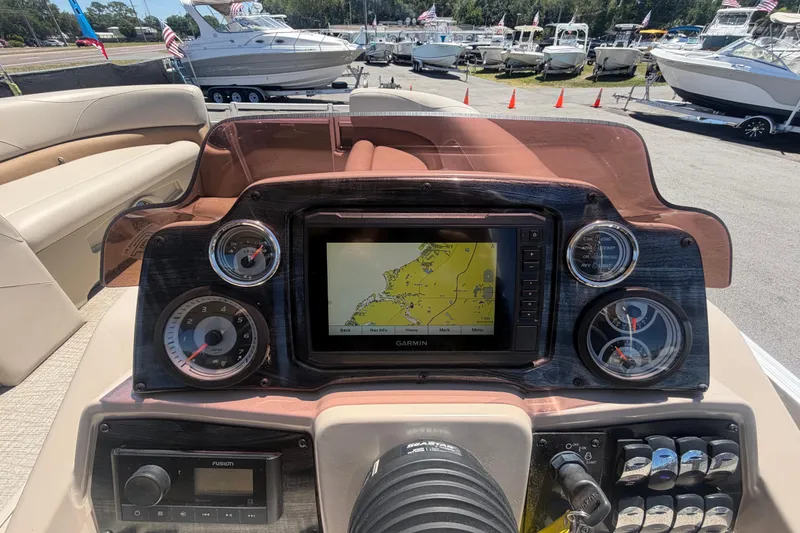 Slide: The Image of Dashboard of 2023 Tahoe Pontoon GT 2385 RF with Garmin navigation system. - 46