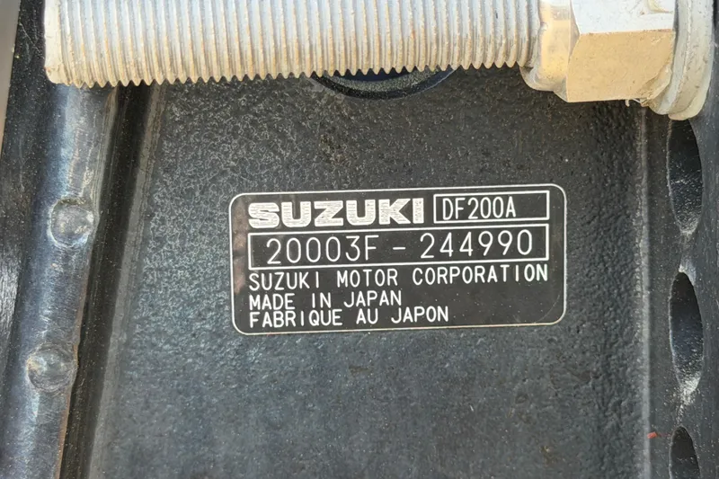 Slide: The Image of Suzuki DF200A engine label on 2023 Tahoe Pontoon GT 2385 RF. - 80