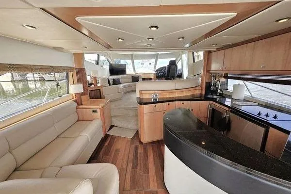 Slide: The Image of Luxurious interior of a 2005 Sunseeker Manhattan 66 yacht with modern furnishings. - 23