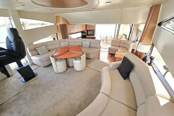Slide: The Image of Luxurious interior of a 2005 Sunseeker Manhattan 66 yacht with elegant seating and modern design. - 35