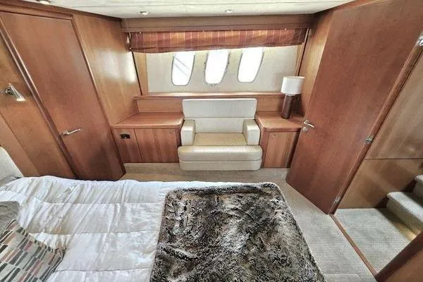 Slide: The Image of Luxurious cabin interior of 2005 Sunseeker Manhattan 66 yacht with plush seating and elegant decor. - 41