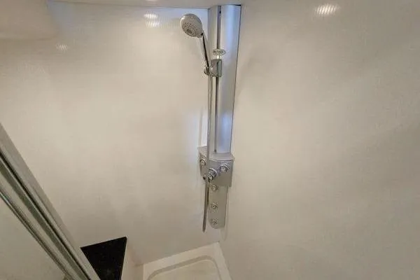 Slide: The Image of Shower area in 2005 Sunseeker Manhattan 66 yacht, featuring modern fixtures. - 48